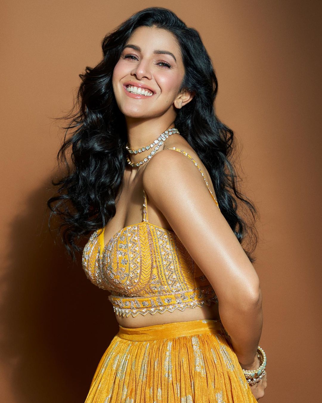 Bollywood Actress Nimrat Kaur Stills In Yellow Lehenga Choli